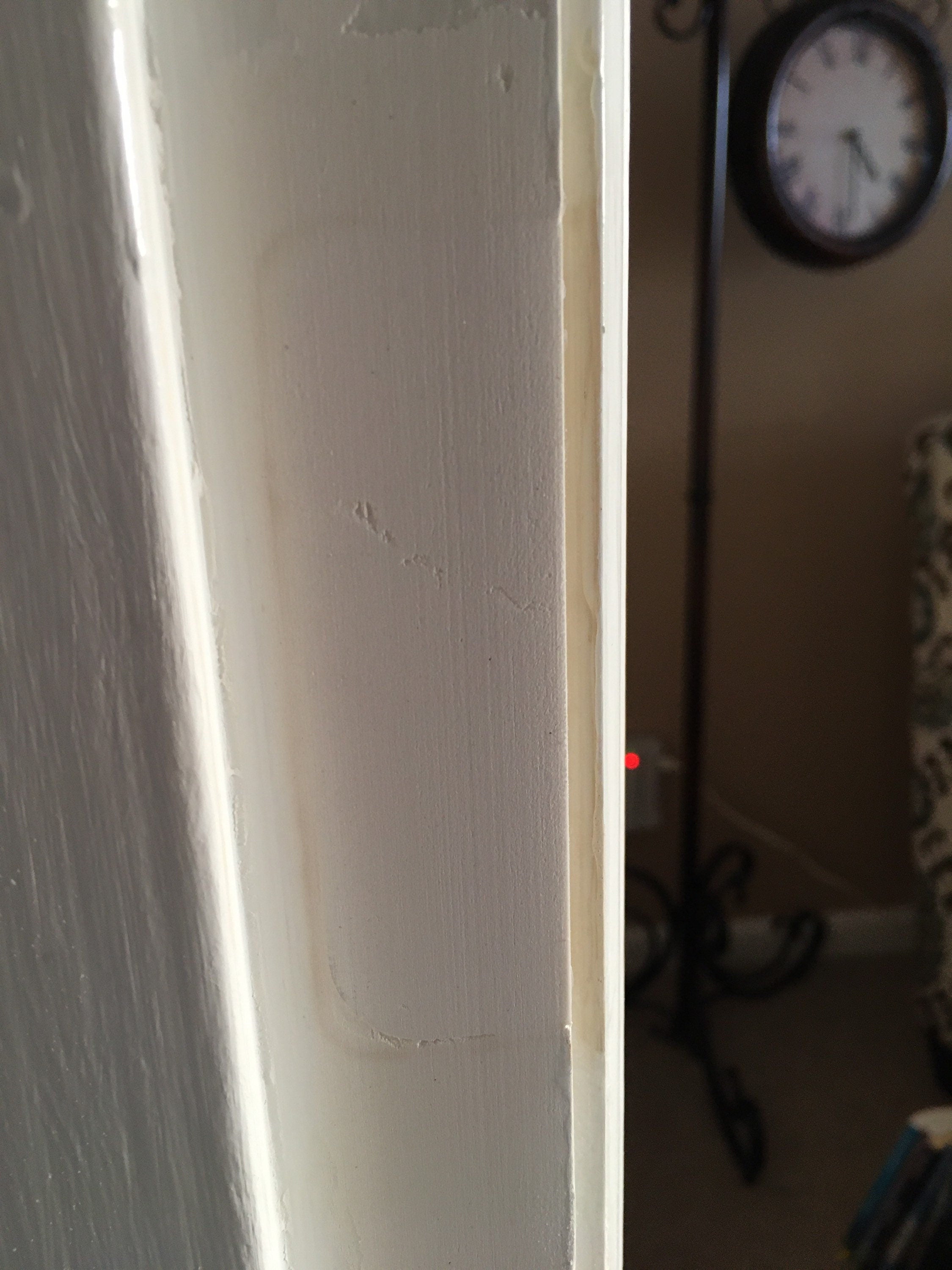 Dutchman hinge filler showing square edges for door frame repair